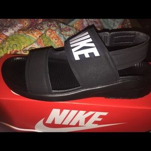 Brand new nike sandals in box.